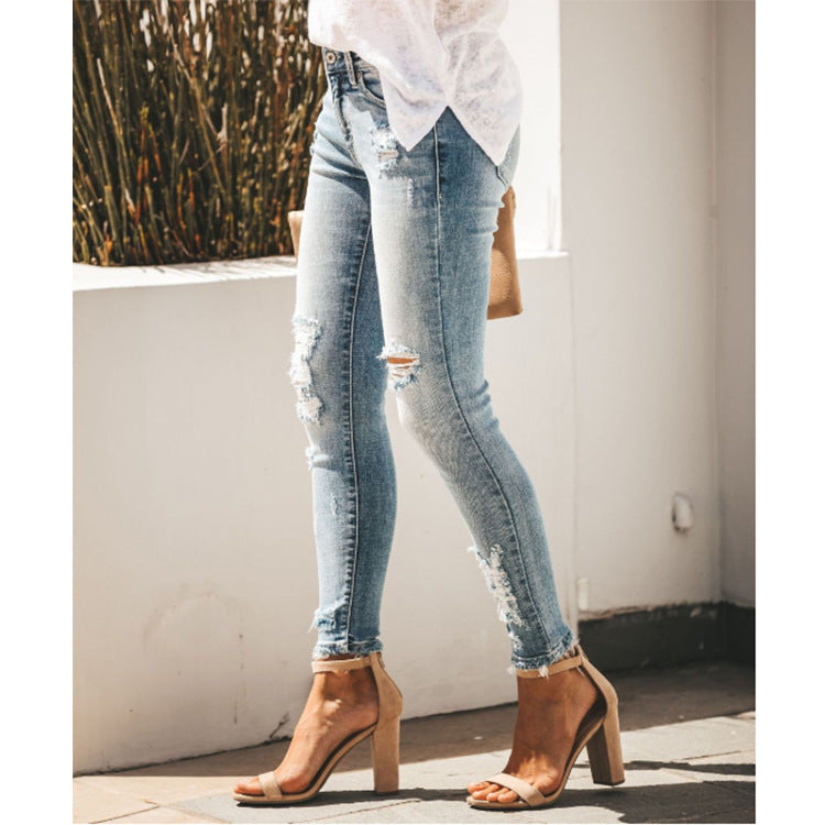 Women's Mid waist Ripped Jeans