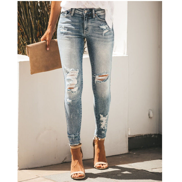Women's Mid waist Ripped Jeans